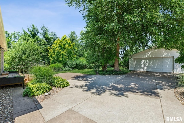 1928 Elm St, Davenport, IA 52803 - exterior space with an outdoor structure and a garage