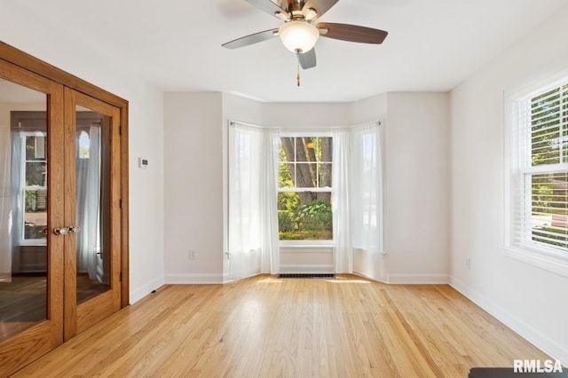 1928 Elm St, Davenport, IA 52803 - unfurnished room with light wood-style flooring and a ceiling fan