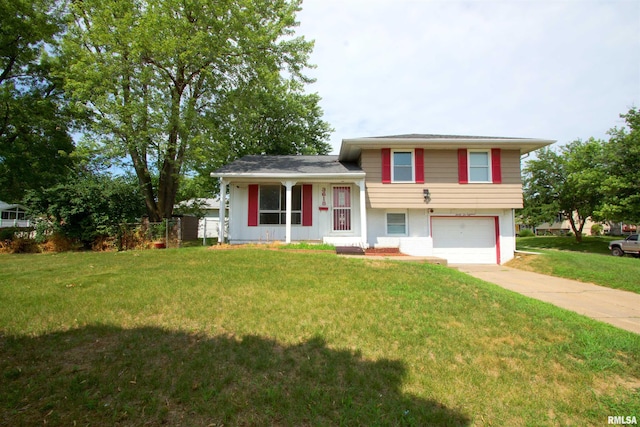 3618 18th St, Bettendorf, IA 52722 - tri-level home with a garage, concrete driveway, and brick siding