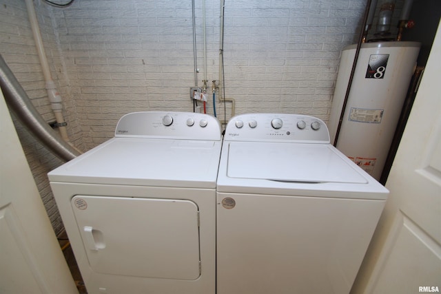 3618 18th St, Bettendorf, IA 52722 - laundry room featuring washing machine and dryer and water heater