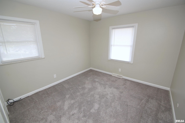 3618 18th St, Bettendorf, IA 52722 - spare room featuring carpet and a ceiling fan