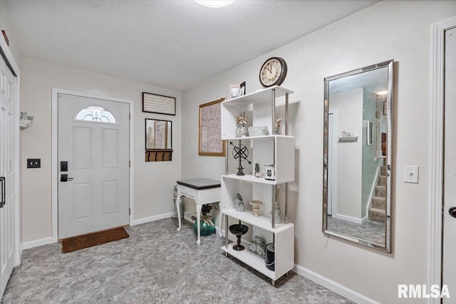 1215 Calvin St, Davenport, IA 52804 - entryway with a textured ceiling and stairs