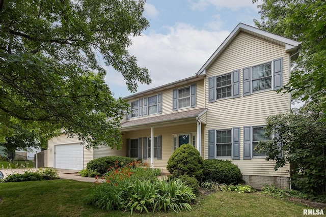 1199 Scenic Place, Le Claire, IA 52753 - traditional home featuring a front yard and an attached garage