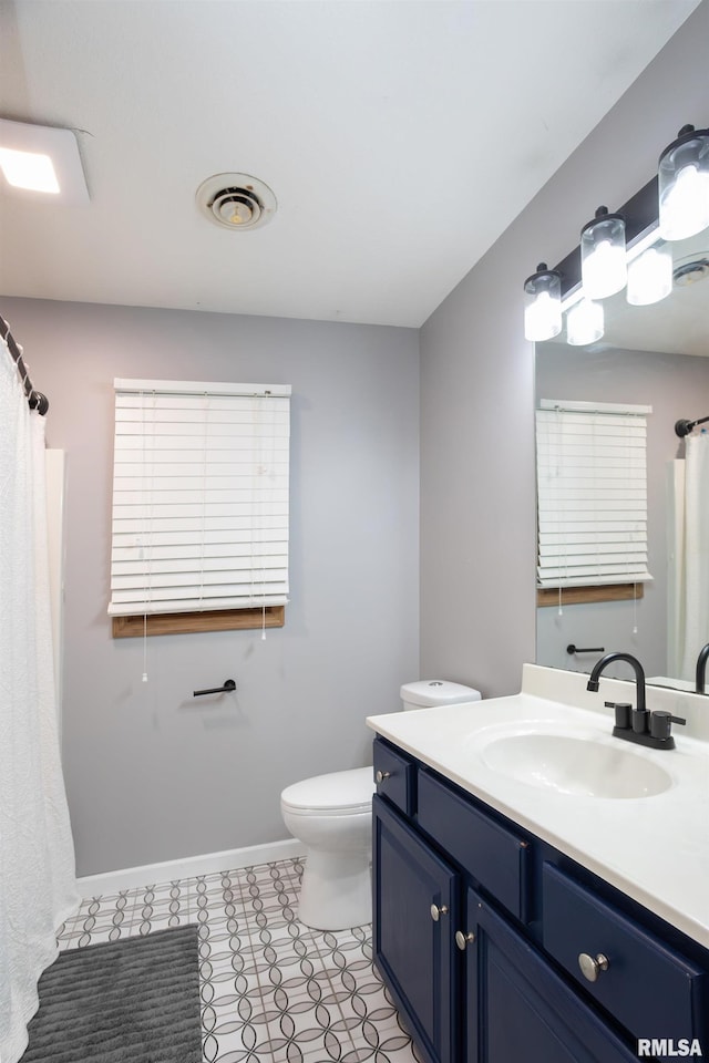 1199 Scenic Place, Le Claire, IA 52753 - bathroom featuring vanity and a shower with shower curtain