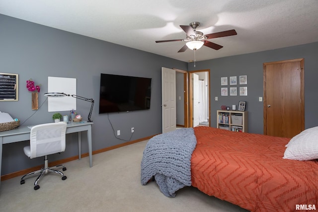 1199 Scenic Place, Le Claire, IA 52753 - carpeted bedroom featuring an office area and a ceiling fan