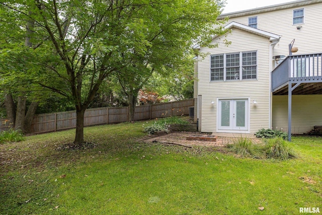 1199 Scenic Place, Le Claire, IA 52753 - view of yard featuring a wooden deck and french doors