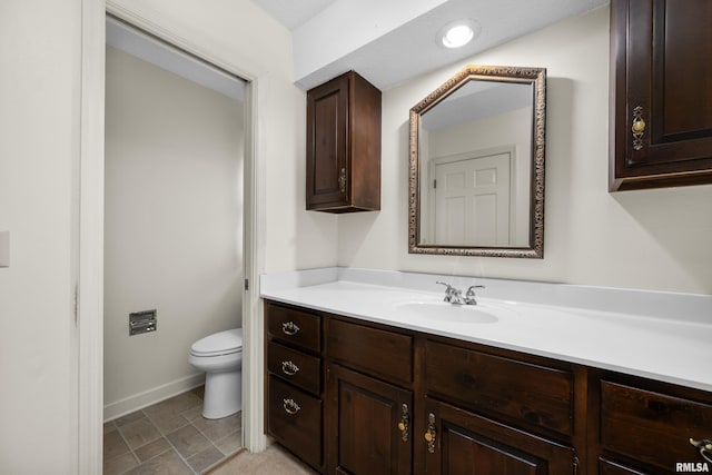 2303 Wynnewood Ct, Davenport, IA 52807 - bathroom with toilet and vanity