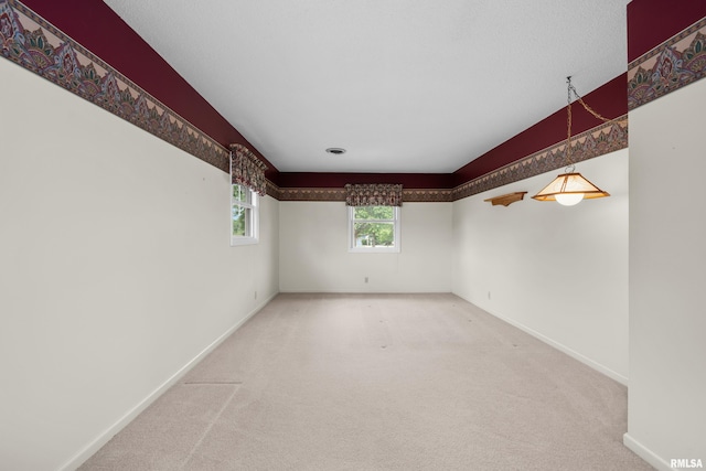 2303 Wynnewood Ct, Davenport, IA 52807 - empty room with carpet floors and baseboards