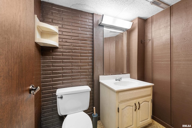 2303 Wynnewood Ct, Davenport, IA 52807 - bathroom with vanity and toilet