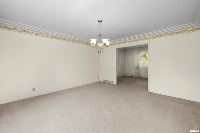 2303 Wynnewood Ct, Davenport, IA 52807 - empty room featuring a chandelier, ornamental molding, and light carpet