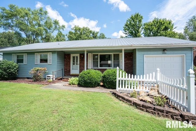 206 Patricia Ln, West Frankfort, IL 62896 - ranch-style home featuring an attached garage, covered porch, a metal roof, and brick siding
