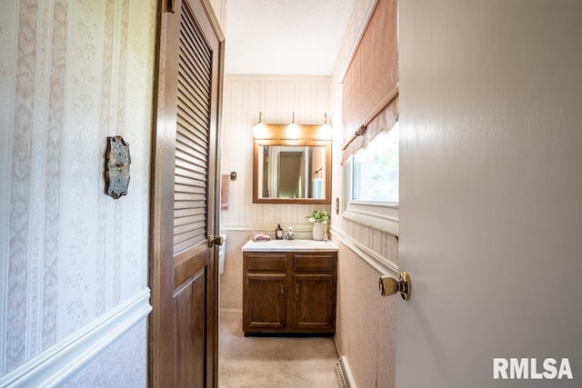 206 Patricia Ln, West Frankfort, IL 62896 - bathroom featuring vanity and wallpapered walls