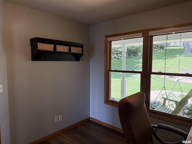 124 Riverview Heights Dr, Le Claire, IA 52753 - office area with dark wood-type flooring and healthy amount of natural light