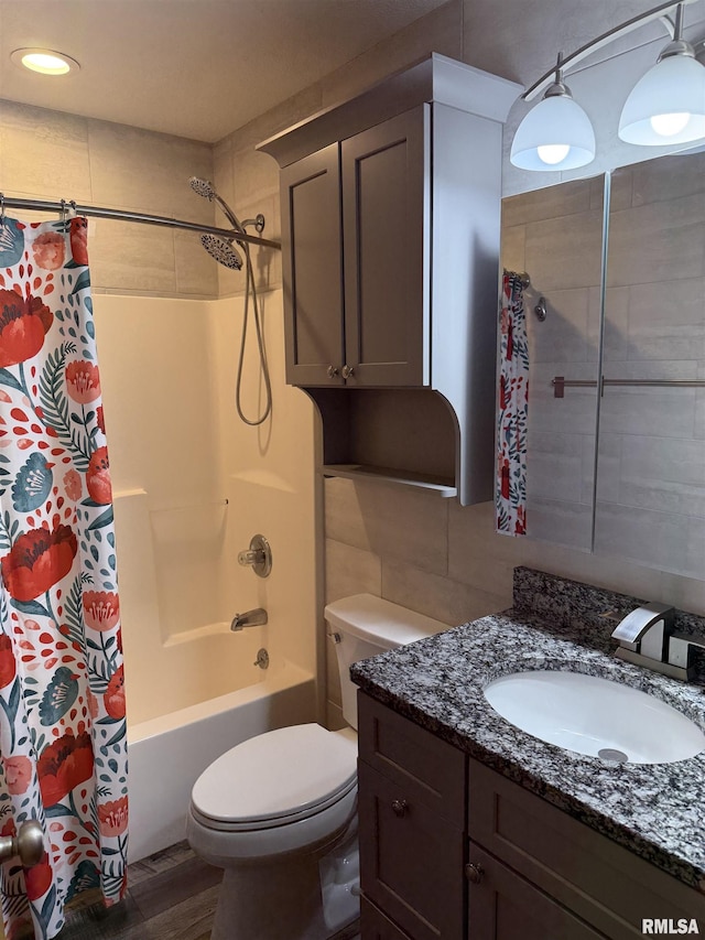 124 Riverview Heights Dr, Le Claire, IA 52753 - bathroom featuring vanity, shower / bath combo with shower curtain, and recessed lighting