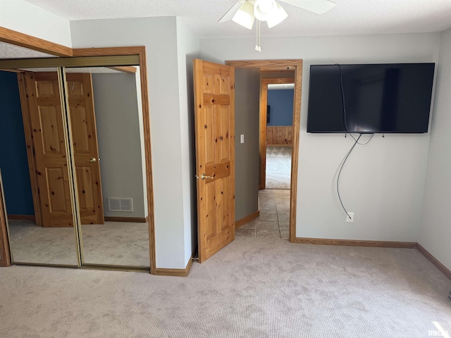 124 Riverview Heights Dr, Le Claire, IA 52753 - unfurnished bedroom featuring carpet floors and a closet