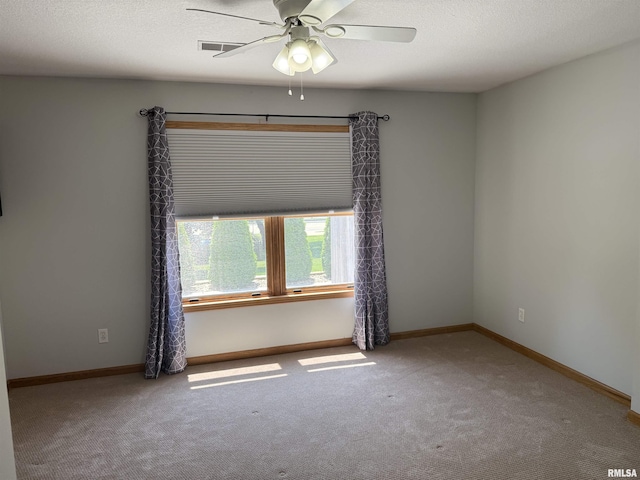 124 Riverview Heights Dr, Le Claire, IA 52753 - carpeted spare room with ceiling fan and baseboards