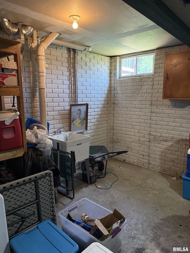 124 Riverview Heights Dr, Le Claire, IA 52753 - below grade area featuring brick wall