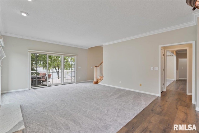 1 S Shore Ln, Rapids City, IL 61278 - unfurnished living room with ornamental molding, stairway, wood finished floors, and a textured ceiling