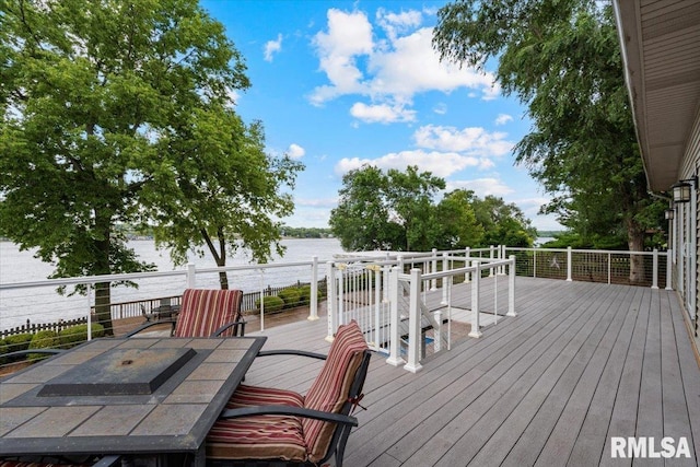 1 S Shore Ln, Rapids City, IL 61278 - deck with outdoor dining space and a water view