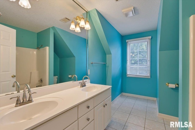 1 S Shore Ln, Rapids City, IL 61278 - full bathroom featuring a textured ceiling, tile patterned flooring, and double vanity