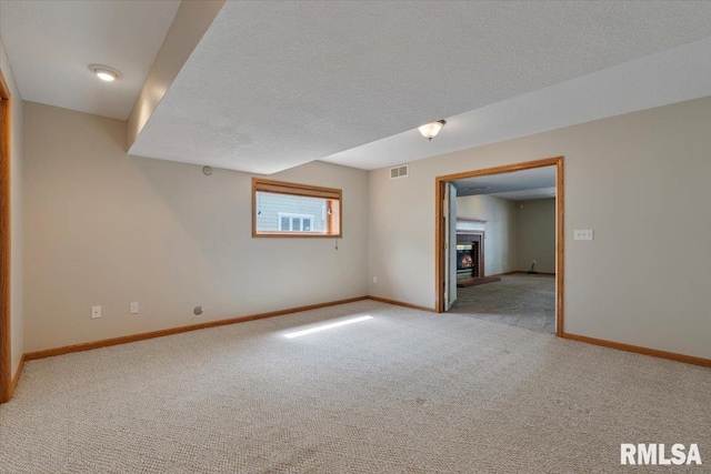 1 S Shore Ln, Rapids City, IL 61278 - spare room featuring light carpet and a brick fireplace