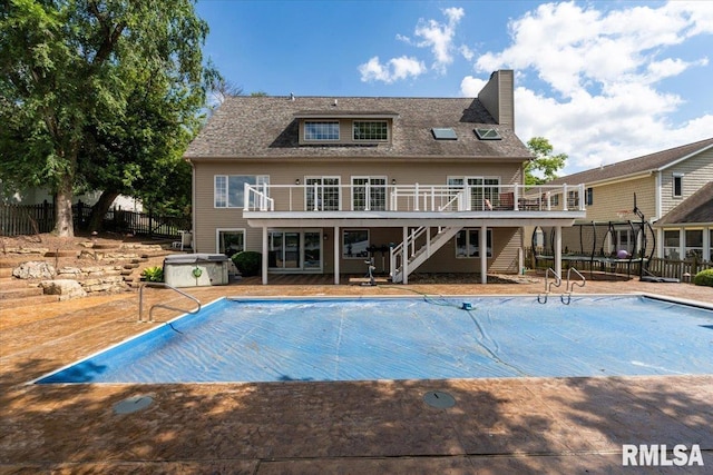 1 S Shore Ln, Rapids City, IL 61278 - view of swimming pool featuring a jacuzzi, stairway, a wooden deck, and a patio