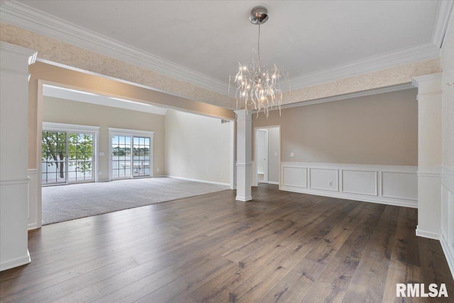 1 S Shore Ln, Rapids City, IL 61278 - unfurnished room featuring a chandelier, hardwood / wood-style floors, decorative columns, wainscoting, and crown molding