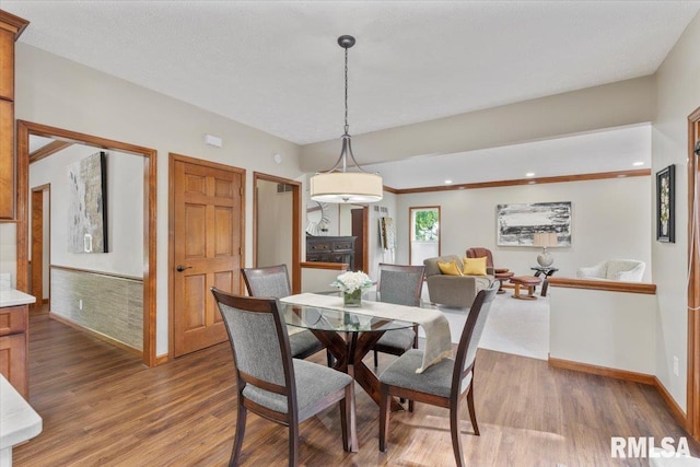 6470 James Rd, Bettendorf, IA 52722 - dining area featuring light wood finished floors and recessed lighting