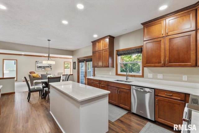 6470 James Rd, Bettendorf, IA 52722 - kitchen featuring dishwasher, dark wood-type flooring, brown cabinets, recessed lighting, and a center island