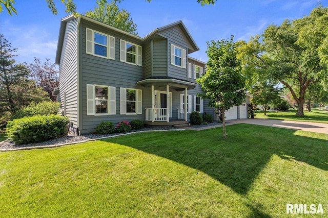 6470 James Rd, Bettendorf, IA 52722 - view of front of property with a garage, driveway, covered porch, and a front yard