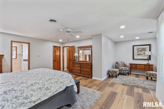 6470 James Rd, Bettendorf, IA 52722 - bedroom with light wood-style floors, recessed lighting, and ceiling fan