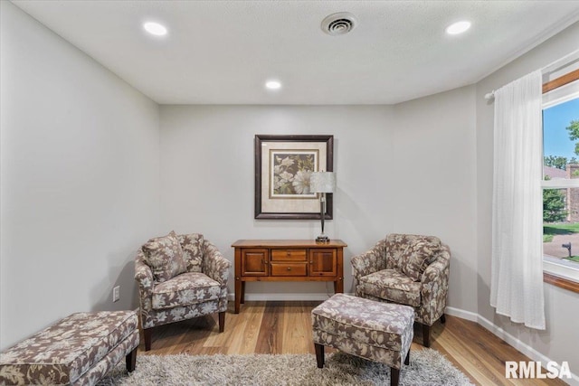 6470 James Rd, Bettendorf, IA 52722 - living area with light wood-type flooring and recessed lighting