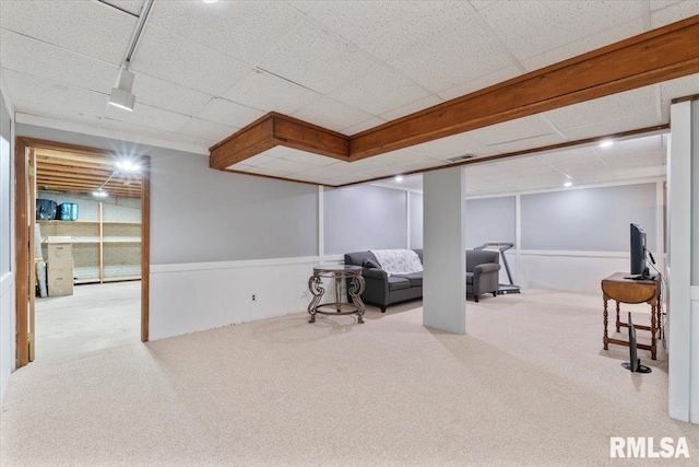 6470 James Rd, Bettendorf, IA 52722 - finished basement featuring carpet floors, a drop ceiling, and a wainscoted wall