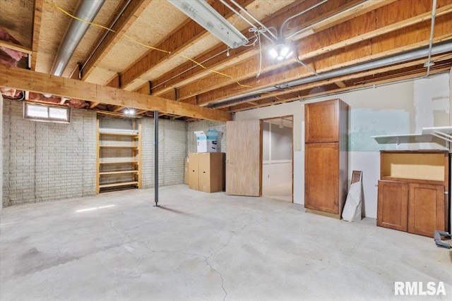 6470 James Rd, Bettendorf, IA 52722 - basement with brick wall