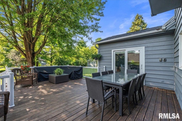 6470 James Rd, Bettendorf, IA 52722 - deck featuring outdoor dining space and an outdoor hangout area