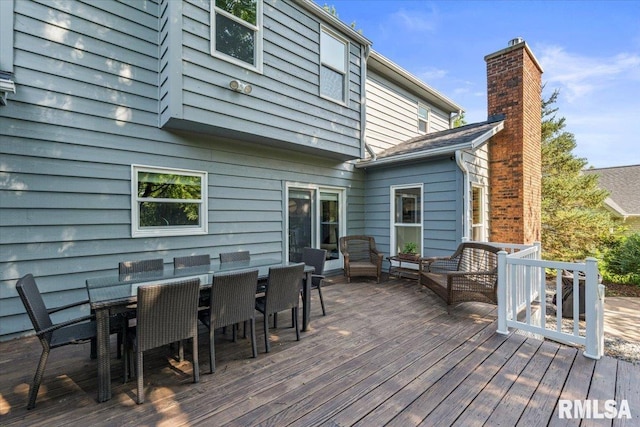 6470 James Rd, Bettendorf, IA 52722 - deck with an outdoor hangout area and outdoor dining space