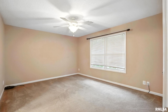 2997 3rd St Unit 206, Moline, IL 61265 - spare room with carpet floors and a ceiling fan