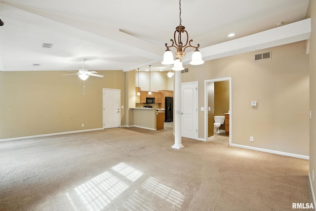 2997 3rd St Unit 206, Moline, IL 61265 - unfurnished living room featuring ceiling fan, light carpet, recessed lighting, and a chandelier