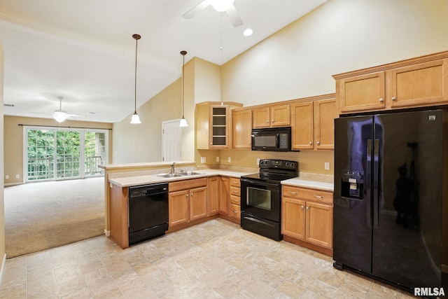 2997 3rd St Unit 206, Moline, IL 61265 - kitchen featuring a ceiling fan, black appliances, high vaulted ceiling, light countertops, and a peninsula