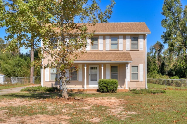 view of front of home featuring a front lawn and a porch