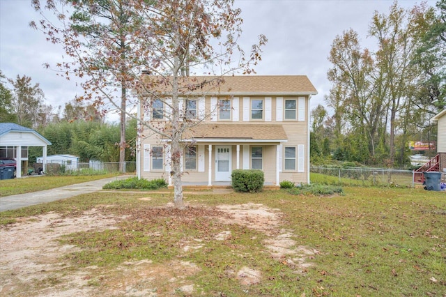 view of front facade featuring a front yard