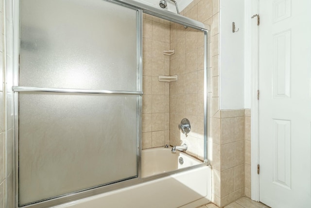 bathroom featuring enclosed tub / shower combo