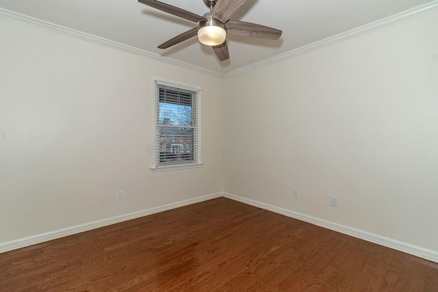 unfurnished room with ceiling fan, dark hardwood / wood-style floors, and crown molding