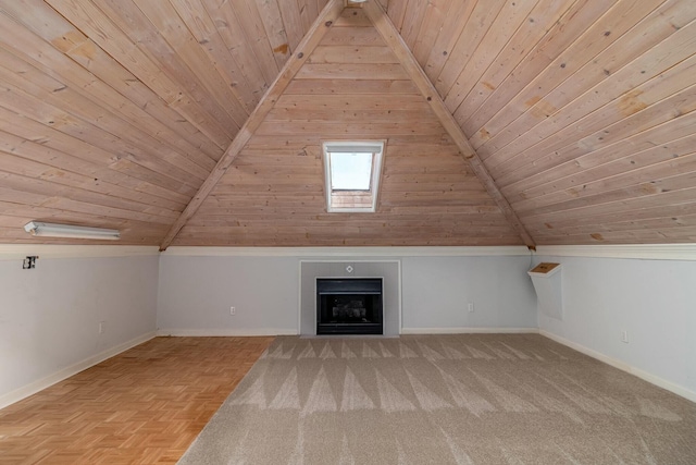 additional living space with wooden ceiling and lofted ceiling