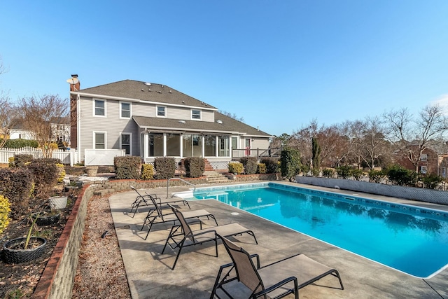 view of pool featuring a patio