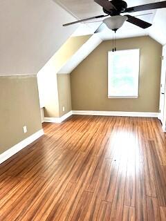 4614 Stoneridge Ct, Evans, GA 30809 - bonus room featuring baseboards, lofted ceiling, wood finished floors, and a ceiling fan