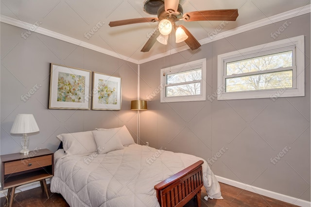 bedroom with a ceiling fan, ornamental molding, and baseboards