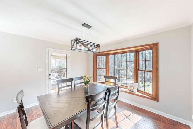 dining area with hardwood / wood-style flooring