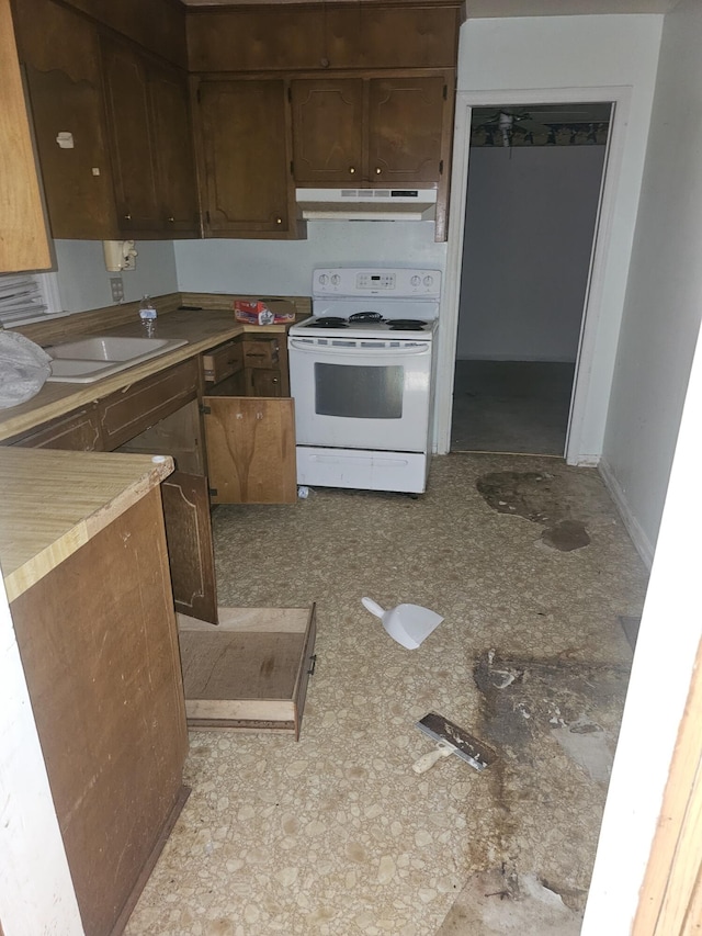 1920 Rozella Rd, Augusta, GA 30904 - kitchen featuring white electric range, under cabinet range hood, and light countertops