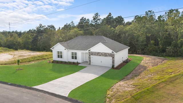 view of front of home with cooling unit, a garage, and a front lawn